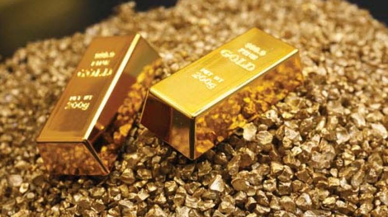 Gold prices decline on weak global cues, low demand