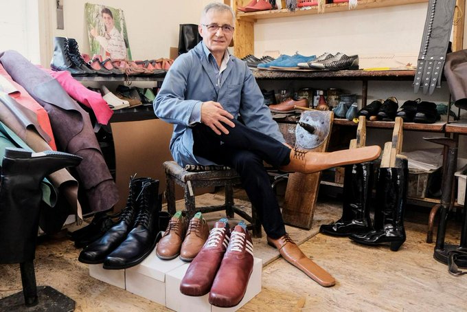 Romanian cobbler keeps people apart with size 75 shoes